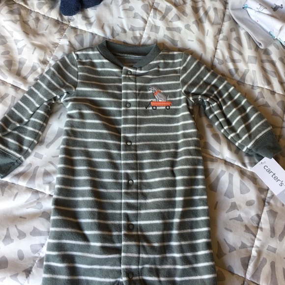 This is a sleeping fleece onesie for a little boy. - Picture 1 of 4