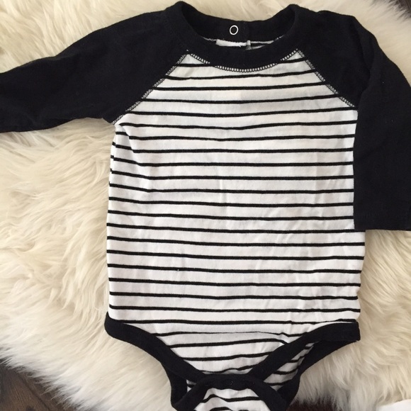 Black and white striped baseball onesie