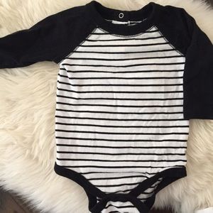 Black and white striped baseball onesie