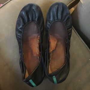 Black leather Tieks.