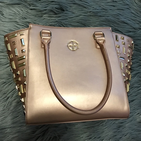 Gianni Bini rose gold studded tote.
