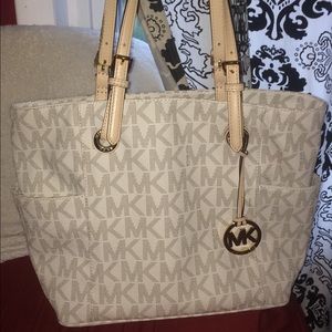 Creme colored Michael Kors purse
