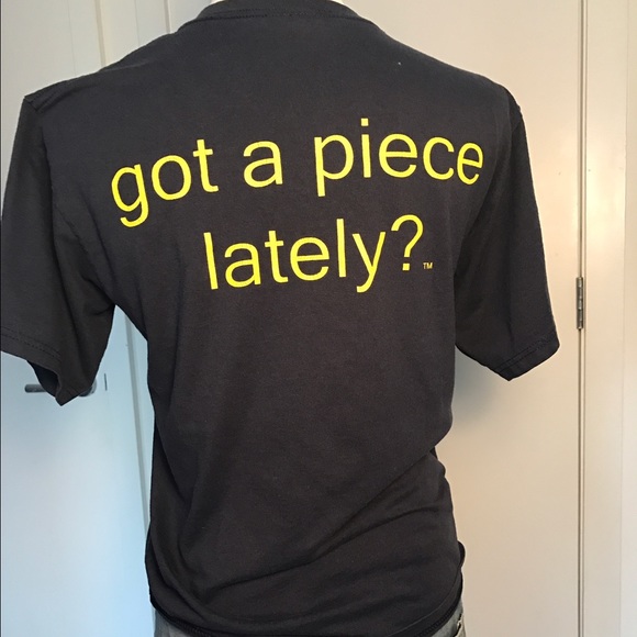 Vintage navy blue tee from a Hawaiian pizza shop.