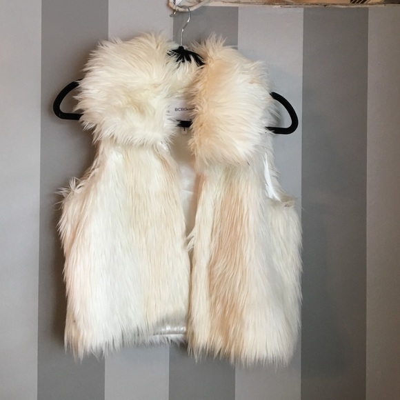 White fur vest
