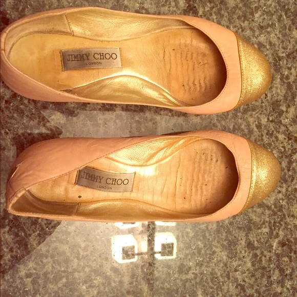 Well loved and used Jimmy Choo flats.
