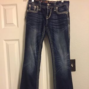 Rock revival low rise boot cut jeans