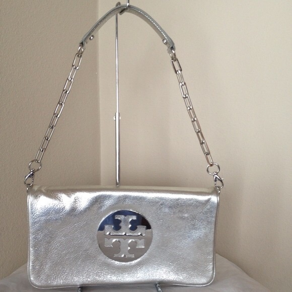 Classic Tory Burch Reva clutch in Silver leather.