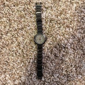Gun metal color, jeweled watch