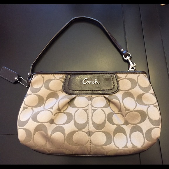 Coach Handbags - Coach brown and tan wristlet 🌺