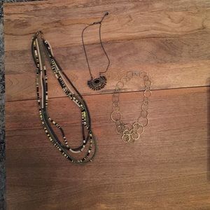 Trio of Anthropologie necklaces.