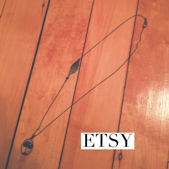 Handmade etsy necklace with tree and leaf detail