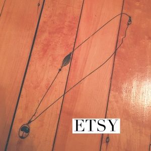 Handmade etsy necklace with tree and leaf detail