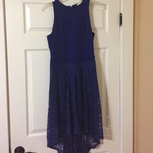 Adorable blue dress with statement back!