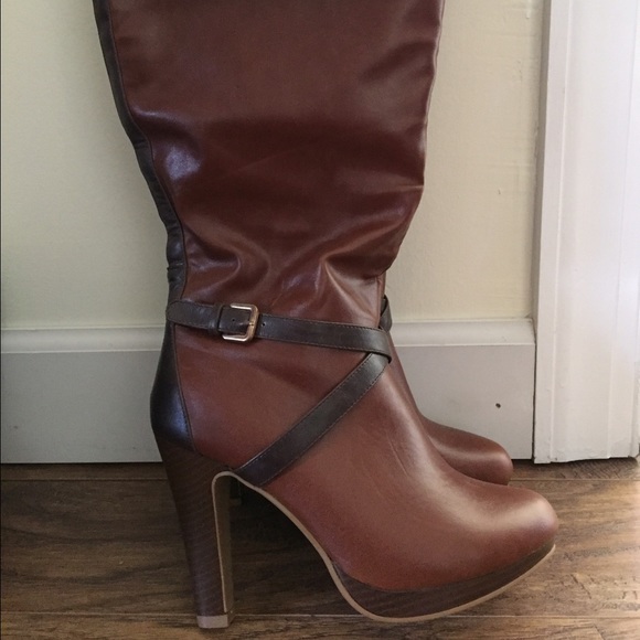 As is - 4 1/2 " heel.  Above the Knee boot.