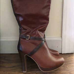 As is - 4 1/2 " heel.  Above the Knee boot.