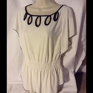 Cute Beige Blouse with Black Trim