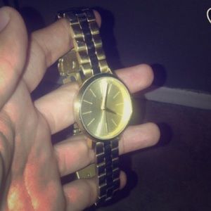 Gold Nixon watch