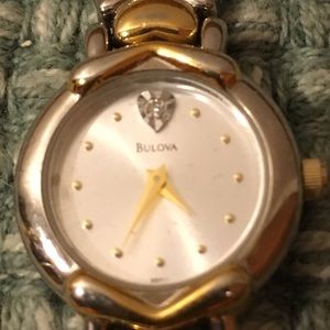 Bulova watch gold hearts w/ diamond heart in dial
