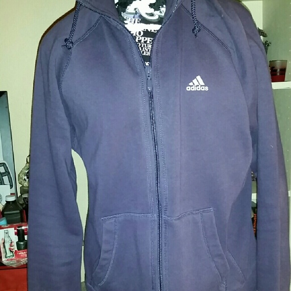 This is a purple Adidas  jacket.