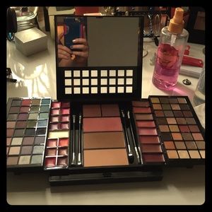 Eye shadow, cheek, highlighter and lip pallet