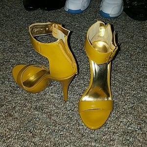 Yellow high heels