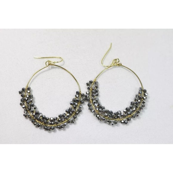 Gold tone metallic earrings