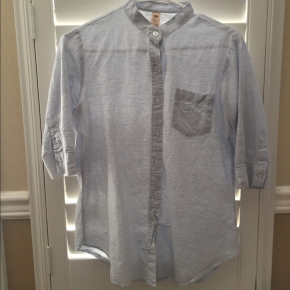 Light blue button down shirt without collar