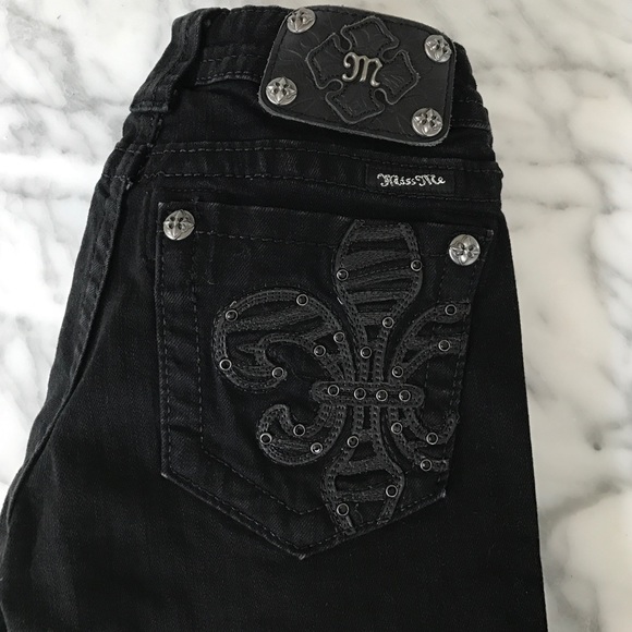 Miss Me Black Skinny Jeans. Fleur De Li on pockets