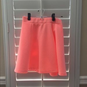 Neon orange mini skirt