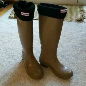 Tall tan Hunter boots with black inserts