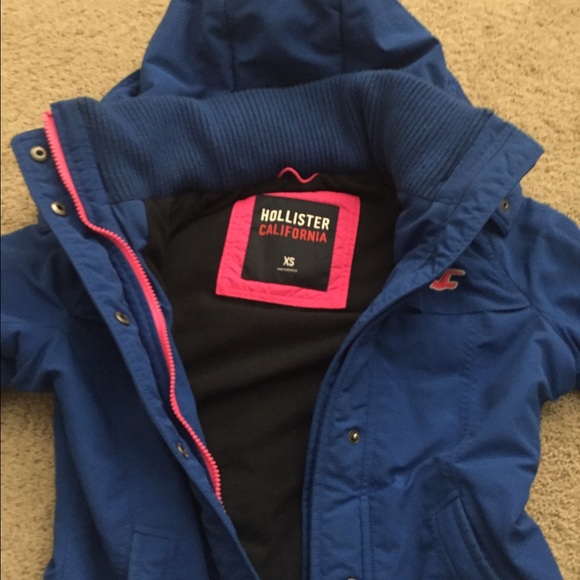 blue raincoat with pink detailing hollister