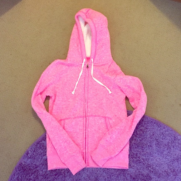 A pink, warm, fluffy zip up sweatshirt.