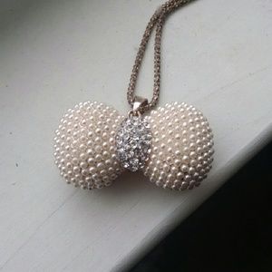 Pearl and crystal bow necklace
