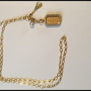 Origami owl rectangular locket with crystals.