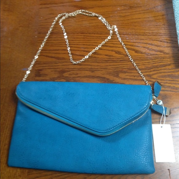 New with tags faux leather crossover/clutch