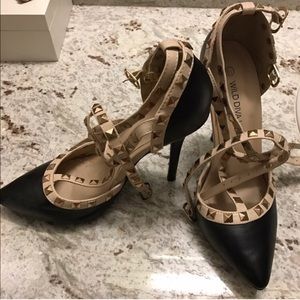 Look alike spike ankle heels.