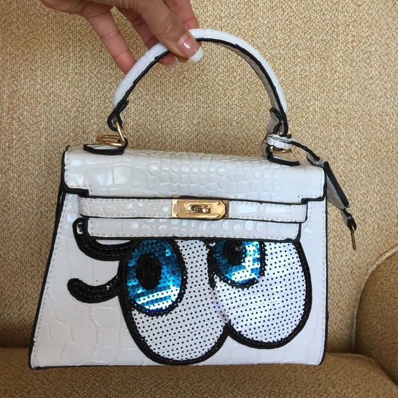Real leather cross body/hand purse 👛 Eye Sequence