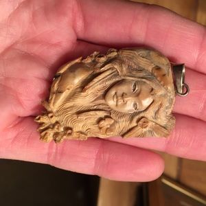 Very unique carved lady face!