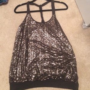 Cute express top. Hunter green with gold sequins