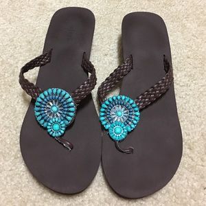 Pretty brown sandals with turquoise medallion!!