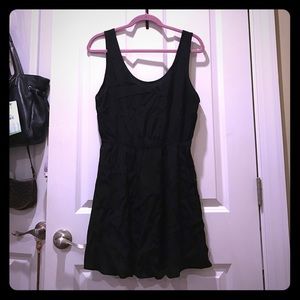 Black dress with peek a boo back detailing!