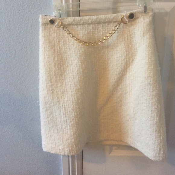An original Milly Knee length white wool skirt.