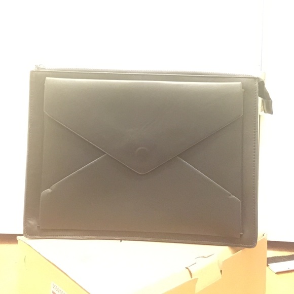 Men's leather two toned clutch.