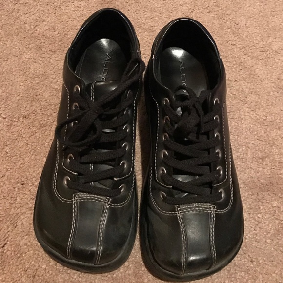 Aldo brand black platform shoes.
