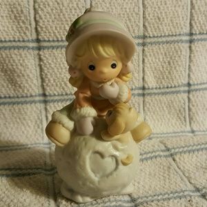 PRECIOUS MOMENTS Girl Sitting on Snowball (Avon)