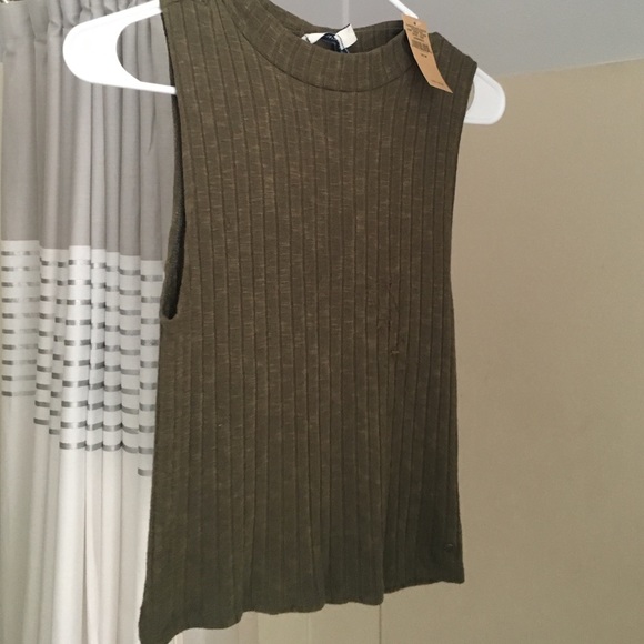 Green turtleneck top