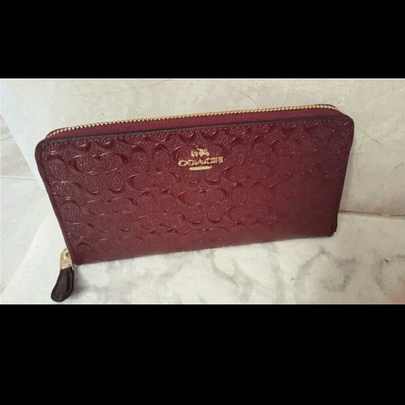 COACH Signature Embossed Accordion Zip Wallet
