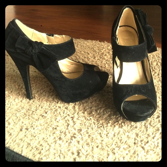 Black faux suade heels, with bow accent
