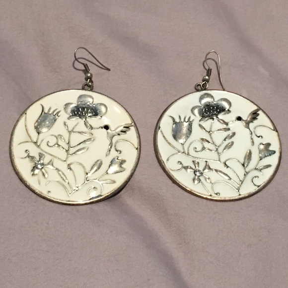 White and silver earrings