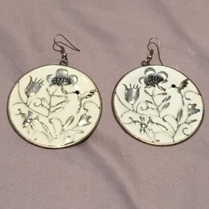 White and silver earrings